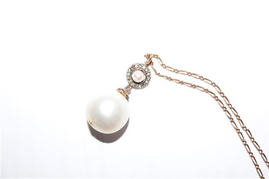 A yellow metal, rose cut diamond and cultured pearl set drop pendant, on a yellow metal chain, pendant approx. 28mm.